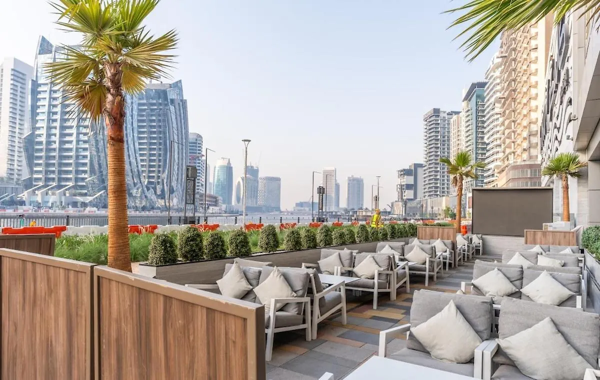 5 Star 2Br W & Infinity Pool Full Canal & Burj Views Dubai